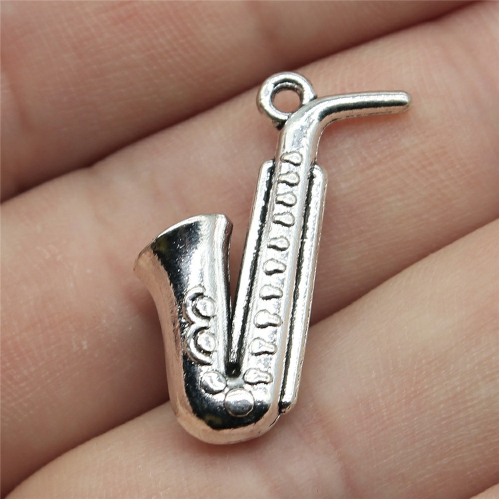 20 piezas de dijes de saxofón  - Musical Instrument Jewelry reseña y precio