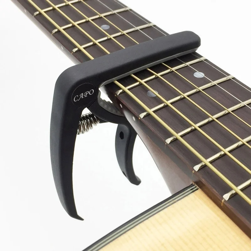 Cejilla de Guitarra de plástic - Musical Instrument Names reseña y precio