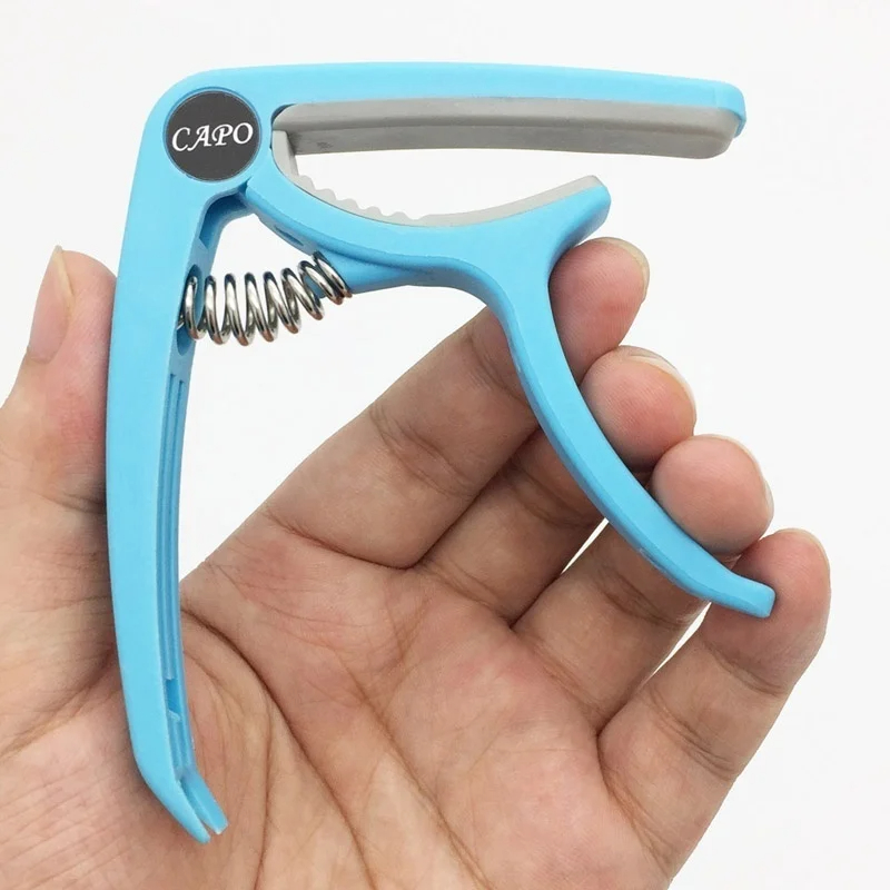 Cejilla de Guitarra de plástic - Musical Instrument Names reseña y precio